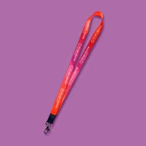 Lanyard naranja y morado con logotipo en blanco de grupo aporte