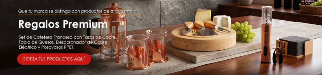 Banner blog regalos corporativos premium: cafetera, tazas y descorchador de cobre, taza de quesos y posavasos