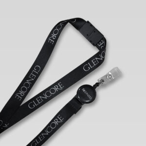 Lanyard de seguridad negro con yoyo, ambos con logo glencore blanco